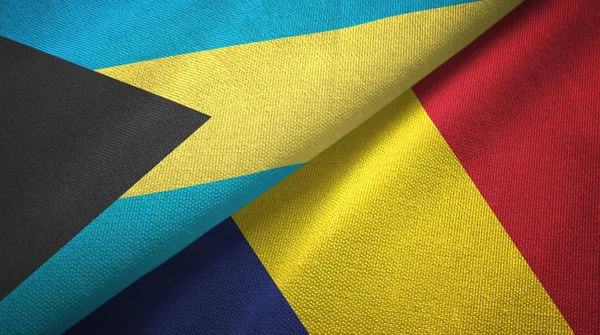Bahamas y Chad dos banderas tela textil, textura de la tela —  Fotos de Stock