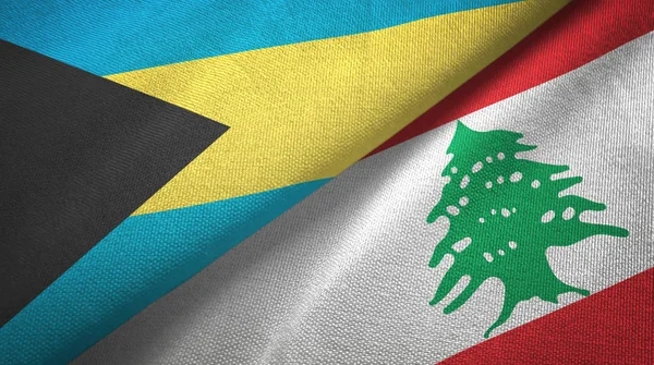 Bahamas et Liban deux drapeaux tissu textile, texture du tissu — Photo