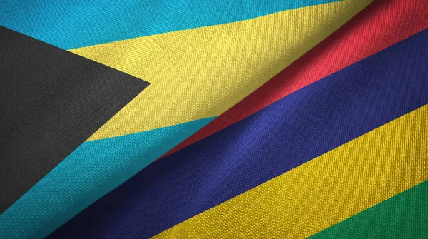Bahamas y Mauricio dos banderas tela textil, textura de la tela —  Fotos de Stock