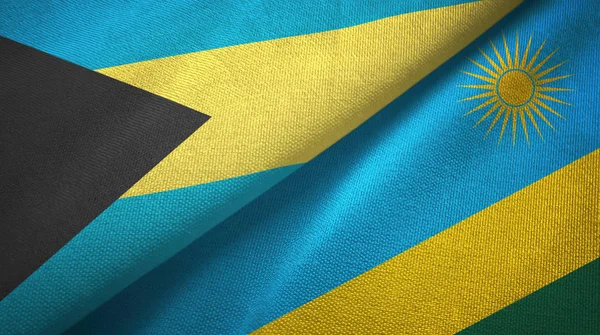 Bahamy i Rwanda dwie flagi tkanina tekstylna, tekstura tkaniny — Zdjęcie stockowe
