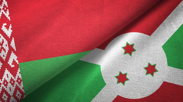 Bielorrússia e Burundi duas bandeiras tecido têxtil, textura de tecido — Fotografia de Stock