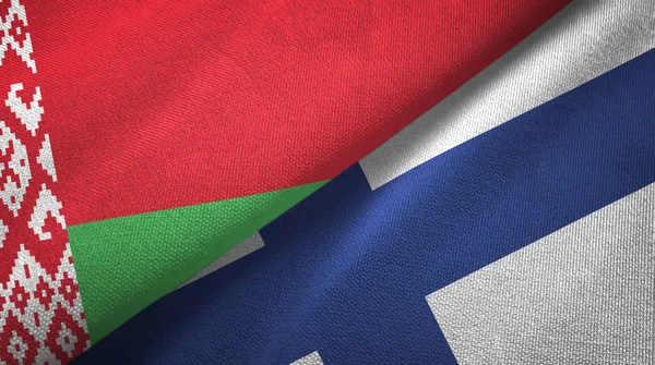 Η Λευκορωσία και η Φινλανδία δύο σημαίες κλωστοϋφαντουργίας ύφασμα, υφή υφάσματος — Φωτογραφία Αρχείου