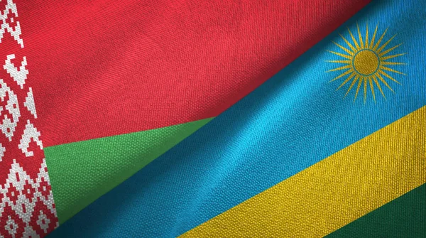 Bielorrusia y Ruanda dos banderas tela textil, textura de la tela — Foto de Stock
