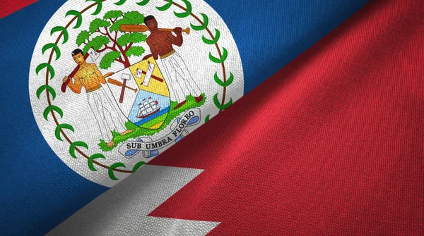 Belize e Bahrain due bandiere tessuto, tessitura del tessuto — Foto Stock