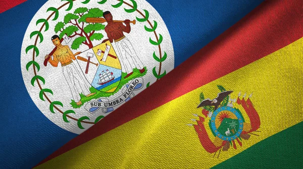 Беліз і Болівія два прапори текстильна тканина, текстура тканини — стокове фото