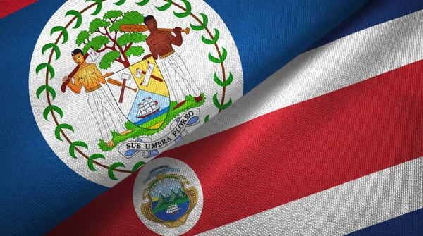 Belize e Costa Rica due bandiere tessuto, tessitura del tessuto — Foto Stock