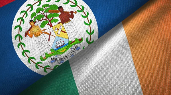 Belize und irland zwei flaggen textiltuch, textur — Stockfoto
