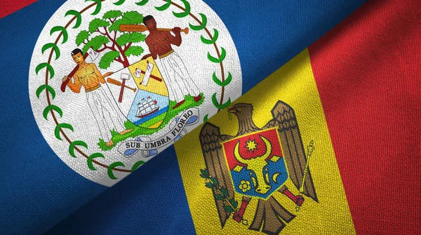 Belize e Moldávia duas bandeiras de pano têxtil, textura de tecido — Fotografia de Stock