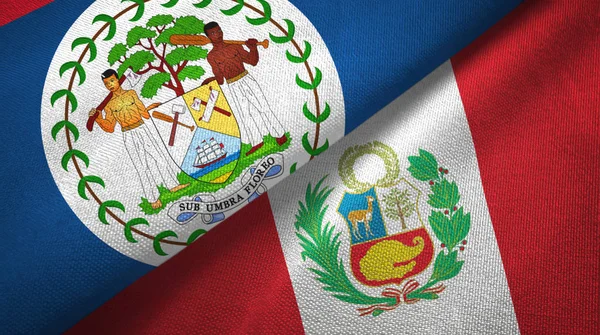 Belize ve Peru iki bayraklar tekstil kumaş, kumaş doku — Stok fotoğraf