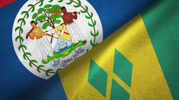 Беліз і Сент-Вінсент і Гренадини два прапори текстильного полотна — стокове фото