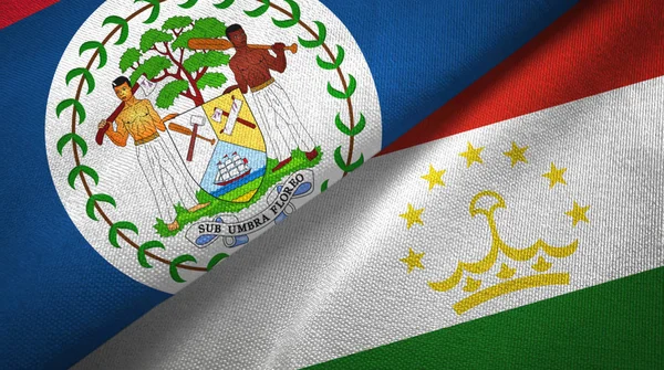 Беліз і Таджикистан два прапори текстильної тканини, текстура тканини — стокове фото