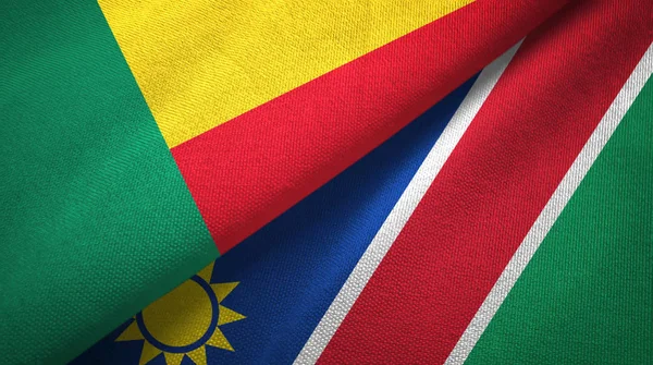 Benin y Namibia dos banderas tela textil, textura de la tela — Foto de Stock