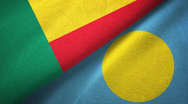 Benin a Palau, dvě vlajky textilní tkaniny, textura — Stock fotografie