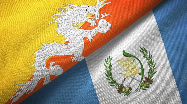 Bhutan e Guatemala due bandiere tessuto, tessitura del tessuto — Foto Stock