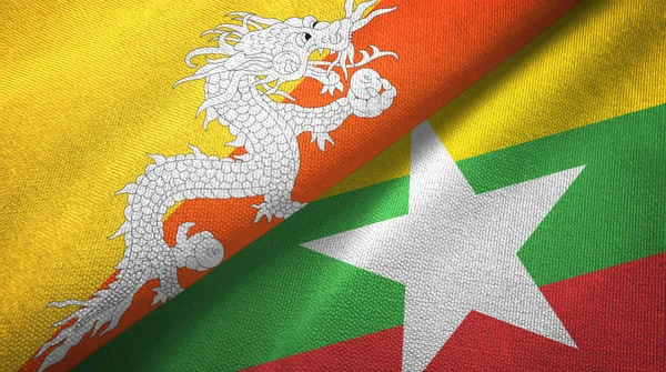 Bhutan und Myanmar zwei Flaggen Textiltuch, Textur — Stockfoto