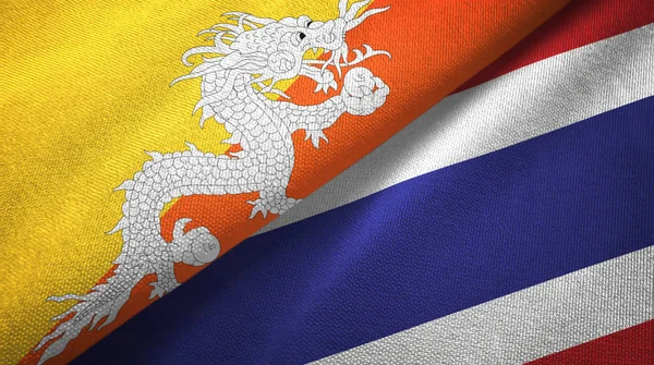 Bhutan and Thailand two flags textile cloth, fabric texture