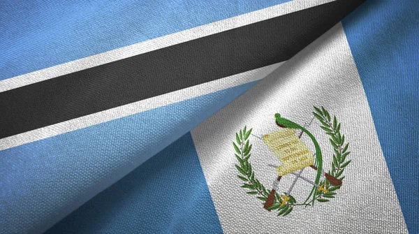 Botswana e Guatemala due bandiere tessuto, tessitura del tessuto — Foto Stock