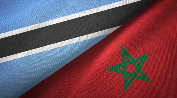 Botswana en Marokko twee vlaggen textiel doek, weefsel textuur — Stockfoto