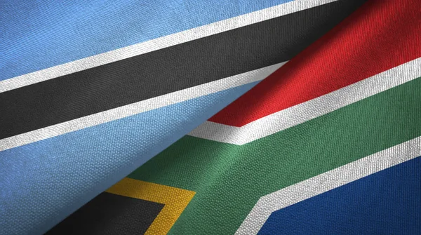 Botsvana ve Güney Afrika iki bayraklar tekstil kumaş, kumaş doku — Stok fotoğraf