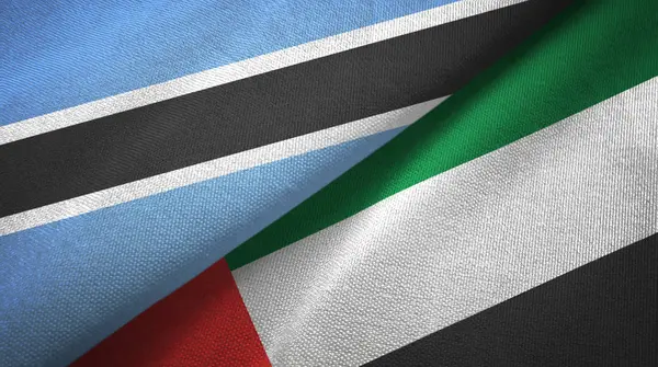 Botswana and United Arab Emirates two flags textile cloth, fabric texture — Stock Photo, Image