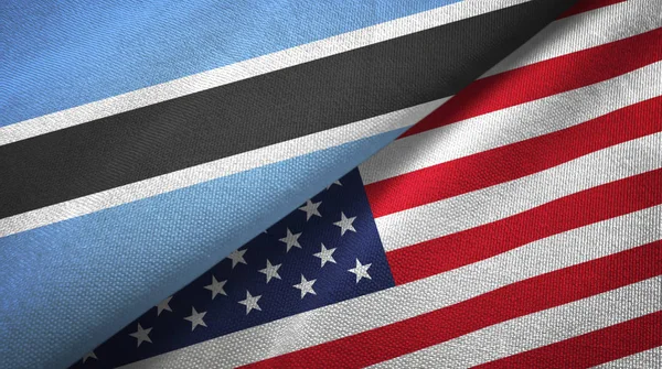 Botswana e Stati Uniti due bandiere tessuto, tessitura del tessuto — Foto Stock