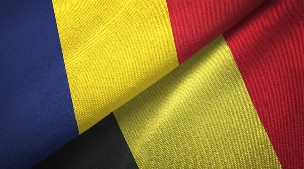 Tsjaad en België twee vlaggen textiel doek, stof textuur — Stockfoto