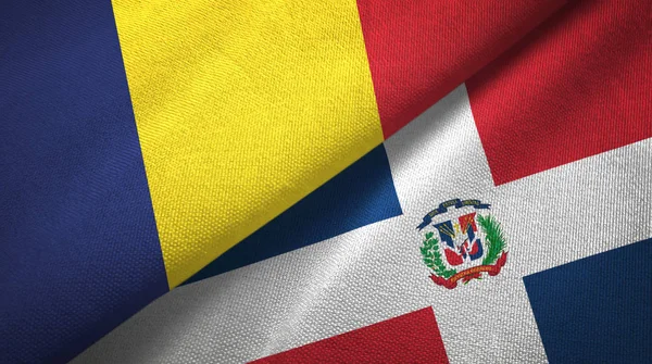 Tsjaad en Dominicaanse Republiek twee vlaggen textiel doek, weefsel textuur — Stockfoto