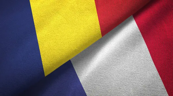 Tsjaad en Frankrijk twee vlaggen textiel doek, stof textuur — Stockfoto