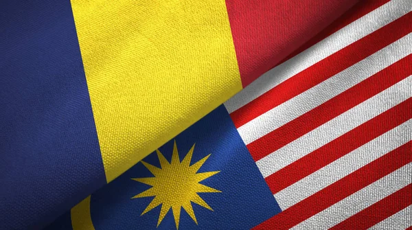 Ciad e Malesia due bandiere tessuto, tessitura del tessuto — Foto Stock