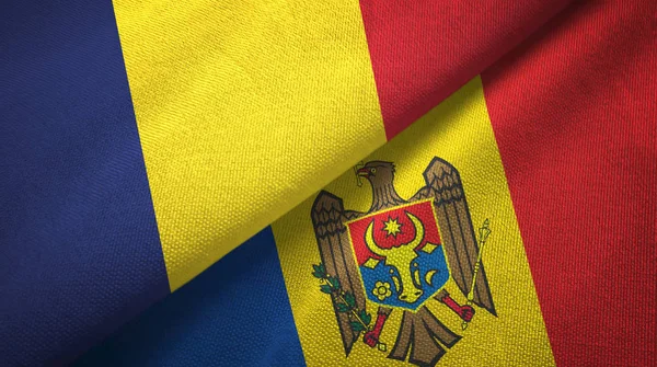 Chad and Moldova two flags textile cloth, fabric texture — Stock Photo, Image
