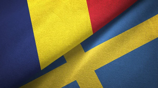 Csád és Svédország két zászló Textil szövet, szövet textúra — Stock Fotó