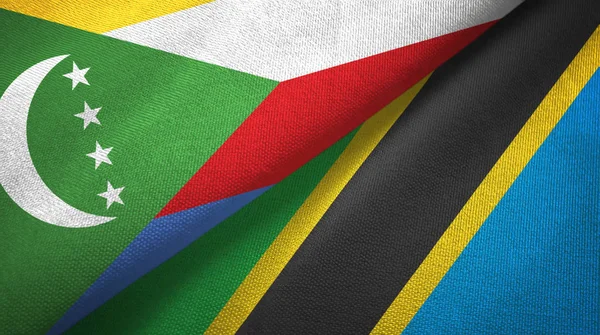 Comore e Tanzania due bandiere tessuto, tessitura tessuto — Foto Stock