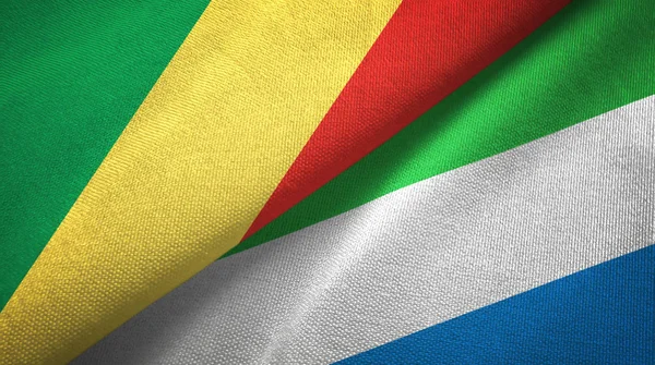 Конго и Сьерра-Леоне два флага текстильная ткань, текстура ткани — стоковое фото