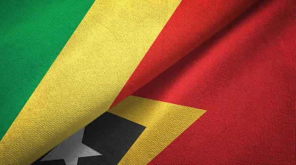 Congo e Timor Est Timor Est due bandiere tessuto, tessitura del tessuto — Foto Stock