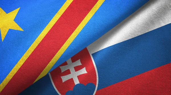 Konžská demokratická republika a Slovensko dvě vlajky textilní tkaniny, textura textilií — Stock fotografie