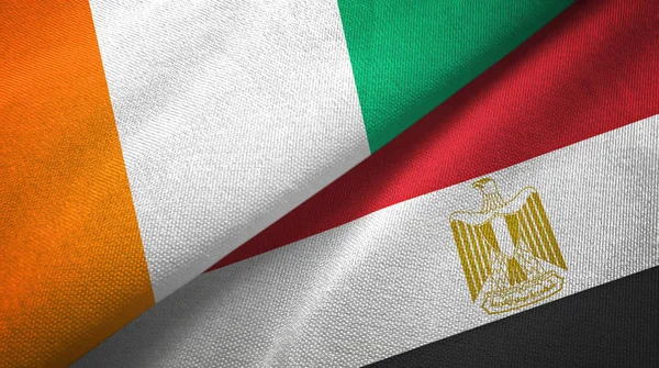 Costa de Marfil y Egipto dos banderas de tela textil —  Fotos de Stock
