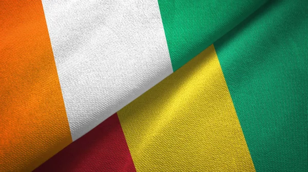 Cote dIvoire and Guinea two flags textile cloth, fabric texture — Stock Photo, Image