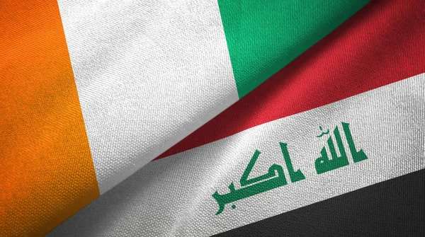 Cote divoire und iraq zwei Flaggen Textiltuch — Stockfoto