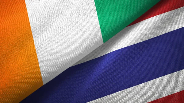 Cote dIvoire and Thailand two flags textile cloth, fabric texture