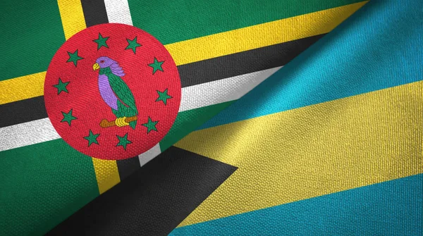 Dominique et Bahamas deux drapeaux tissu textile, texture du tissu — Photo