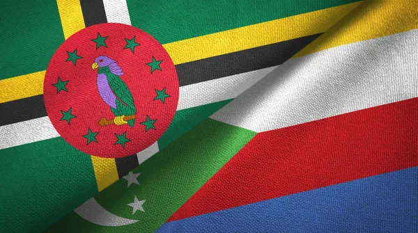 Dominika ve Komor iki bayrak tekstil kumaş, kumaş doku — Stok fotoğraf