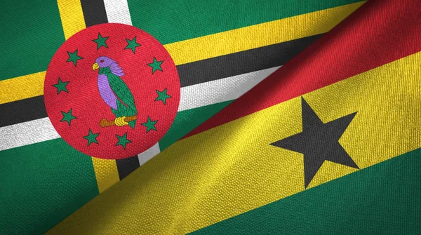 Dominique et Ghana deux drapeaux tissu textile, texture du tissu — Photo