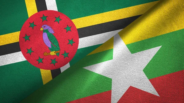 Dominica e Myanmar due bandiere tessuto, tessitura tessuto — Foto Stock