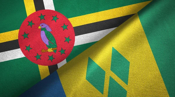 Dominique et Saint-Vincent-et-les Grenadines deux drapeaux tissu textile — Photo