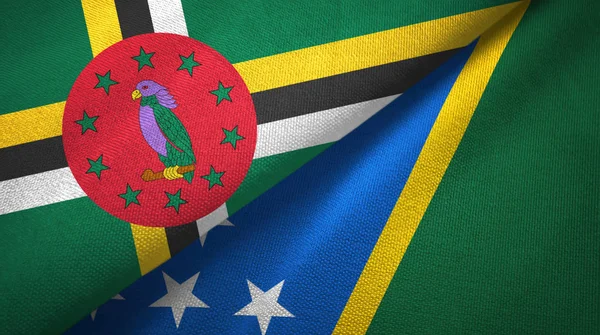 Dominica e Isole Salomone due bandiere tessuto, tessitura tessuto — Foto Stock