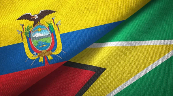 Ecuador och Guyana två flaggor textil trasa, tyg konsistens — Stockfoto