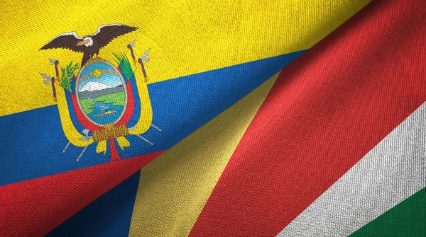 Ecuador och Seychellerna två flaggor textil tyg, tyg konsistens — Stockfoto