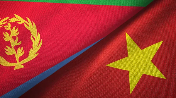 Eritrea y Vietnam dos banderas tela textil, textura de la tela — Foto de Stock