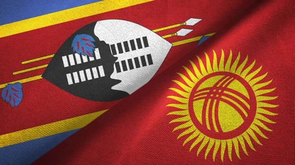 Eswatini Swazilandia y Kirguistán dos banderas tela textil, textura de la tela — Foto de Stock