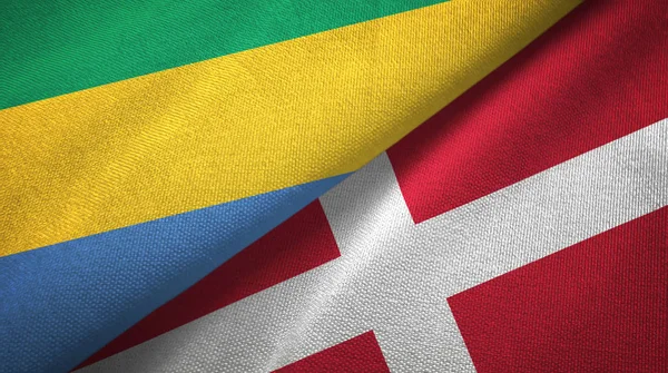 Gabón y Dinamarca dos banderas tela textil, textura de la tela —  Fotos de Stock